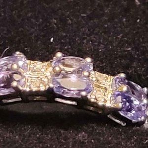 woman's diamond and tanzanite ring